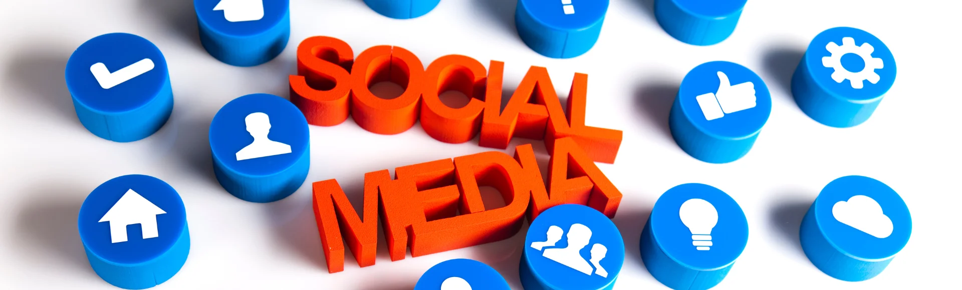 The words SOCIAL MEDIA in bold orange letters surrounded by blue icon tokens for check, person, follow, like, settings, idea and community
